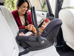 infant car seat installed rear-facing in back seat of car