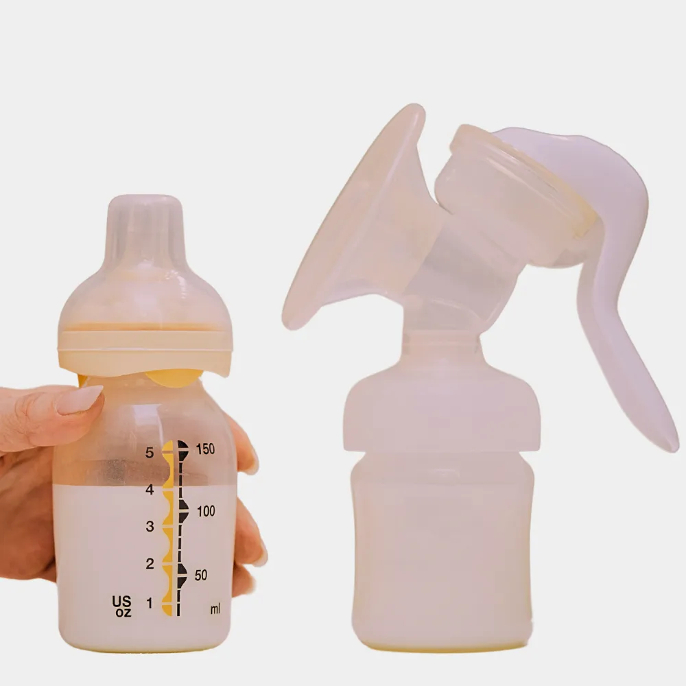 Close-up image of a modern breastfeeding pump with its components, highlighting the mechanism that aids mothers in expressing milk efficiently.